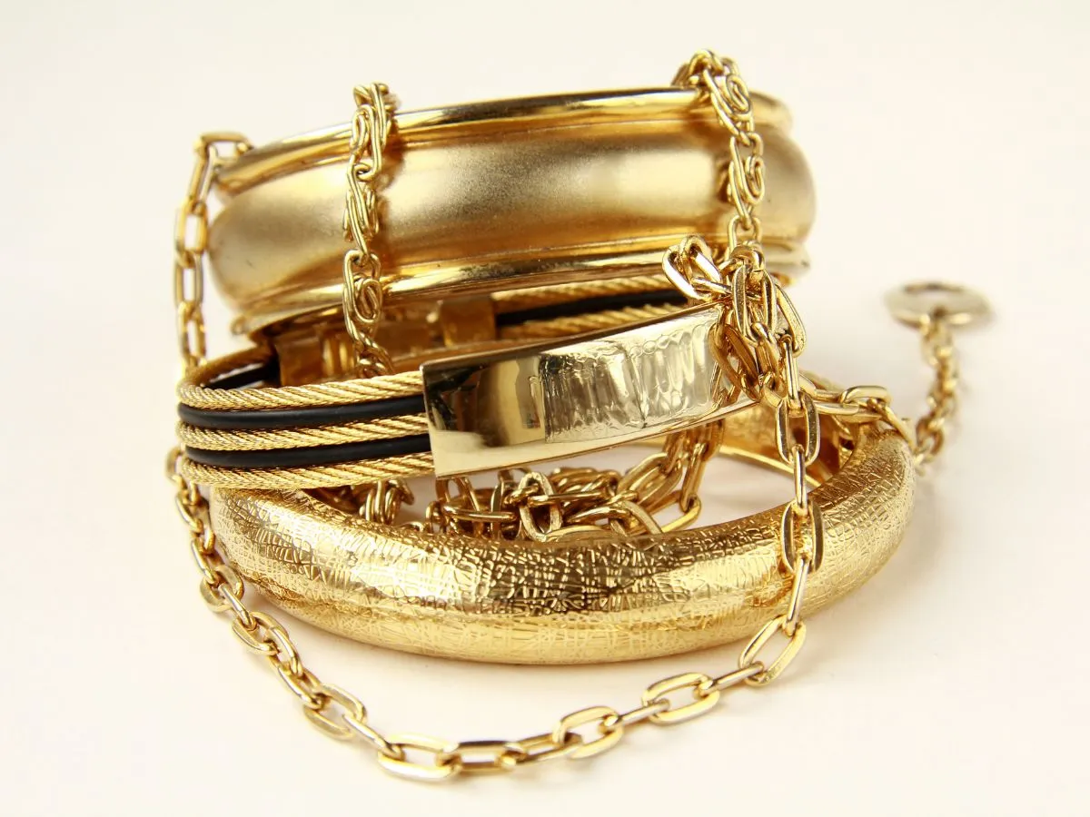 Elegant gold bracelets with chain details