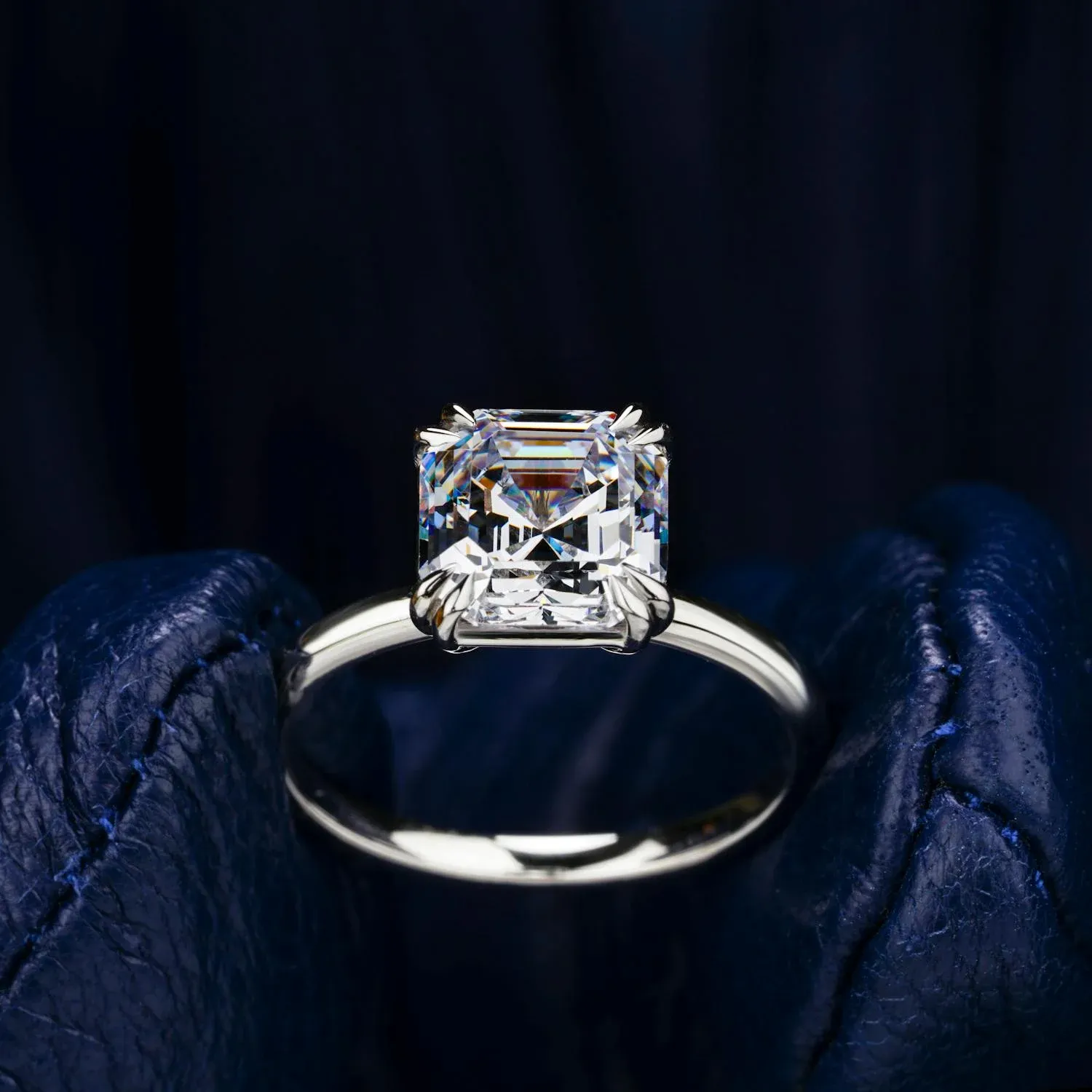 Radiant-cut custom engagement ring on display