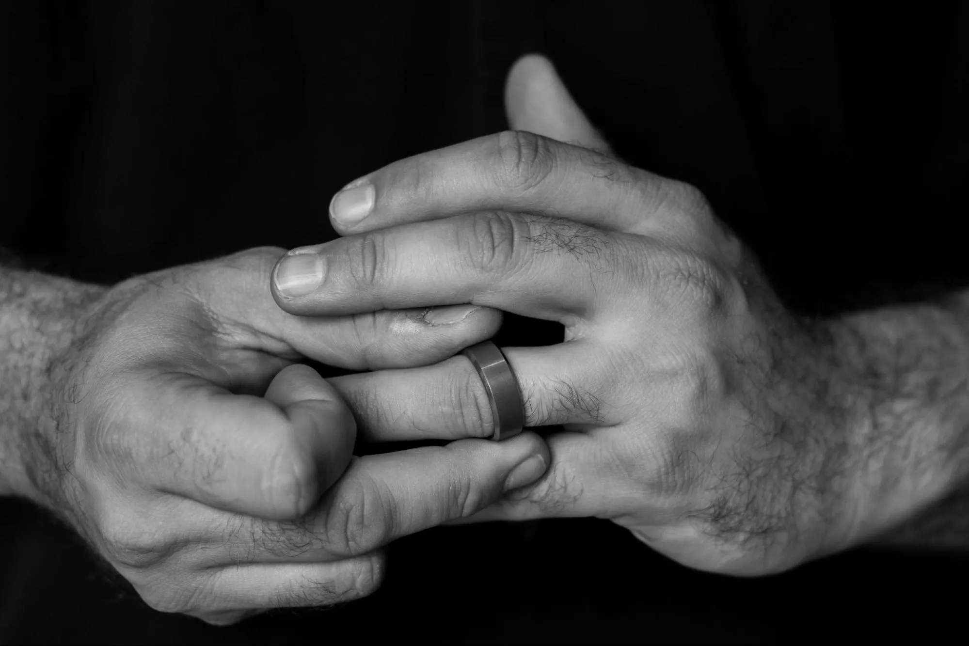 Close-up of fingers wearing fashion ring