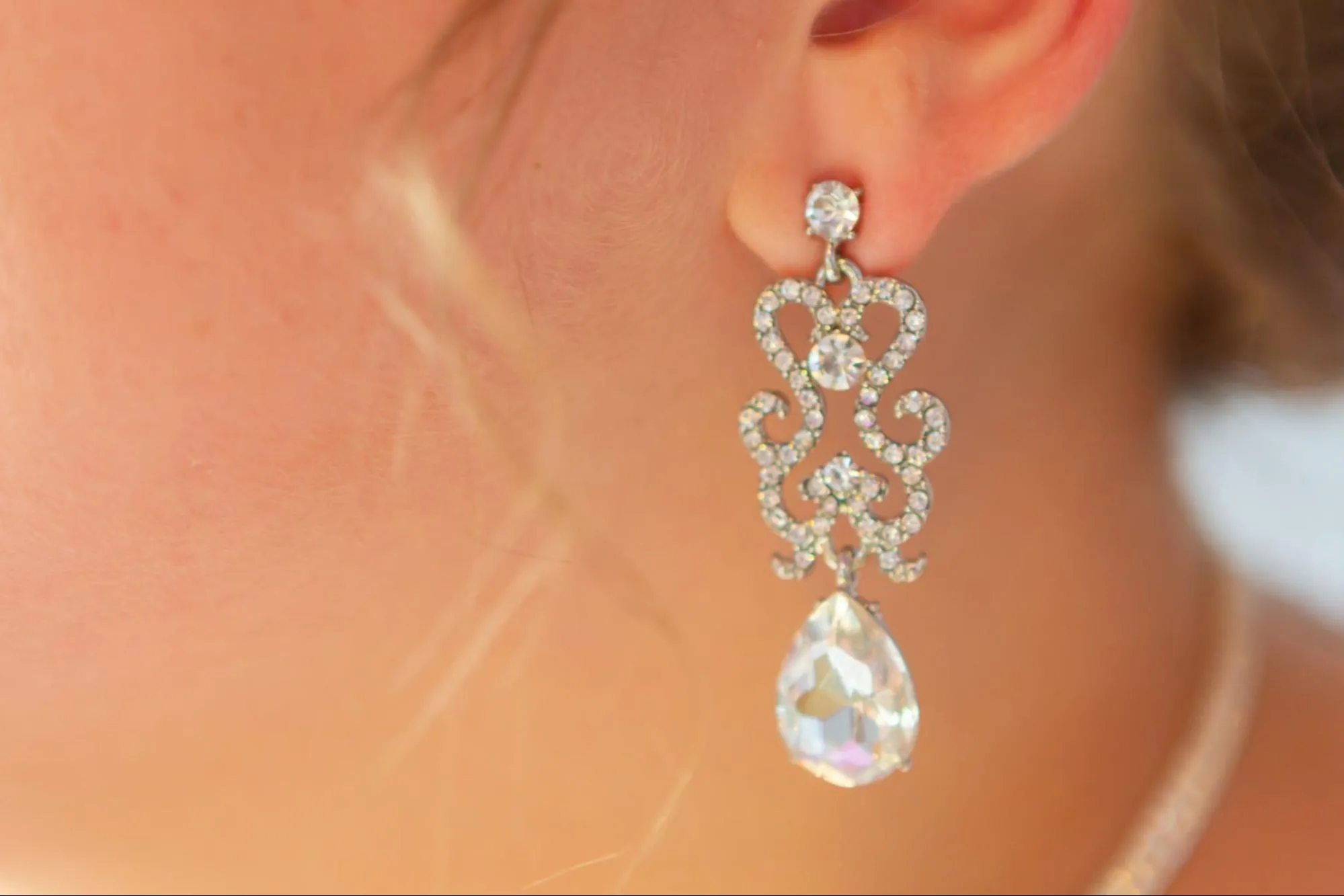 Woman wearing diamond earrings
