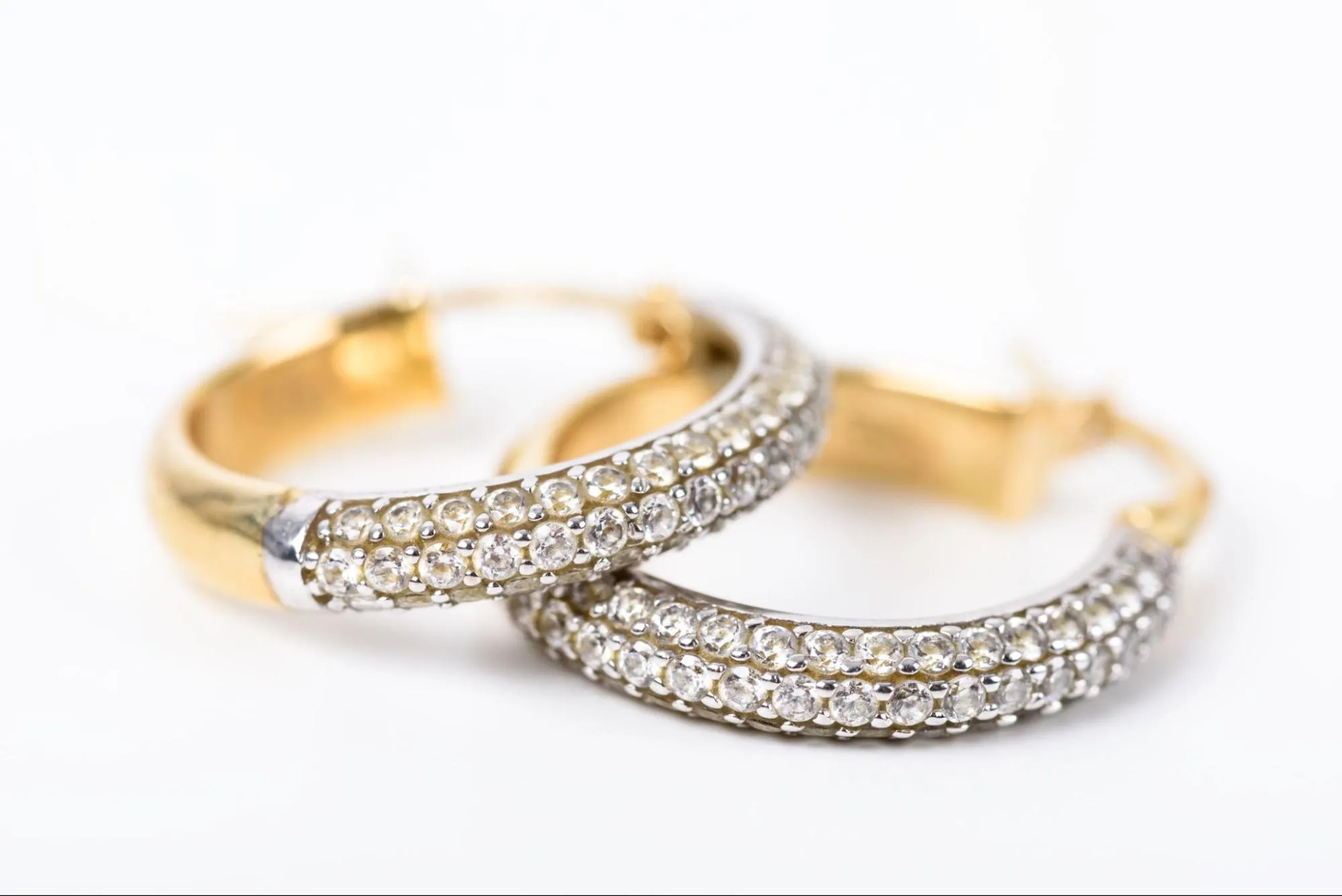 Gold hoop earrings with diamond accents