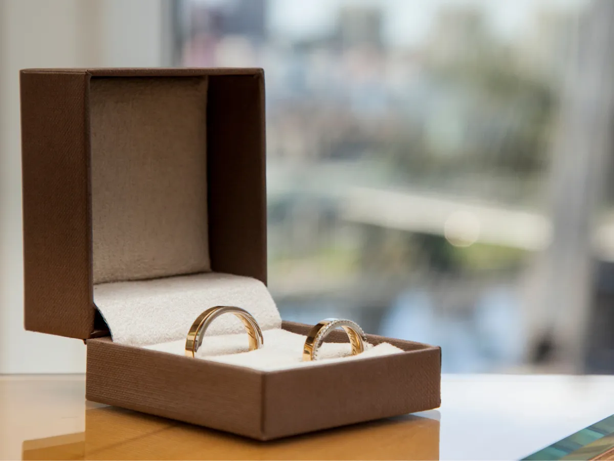 Side view of wedding bands in jewelry box