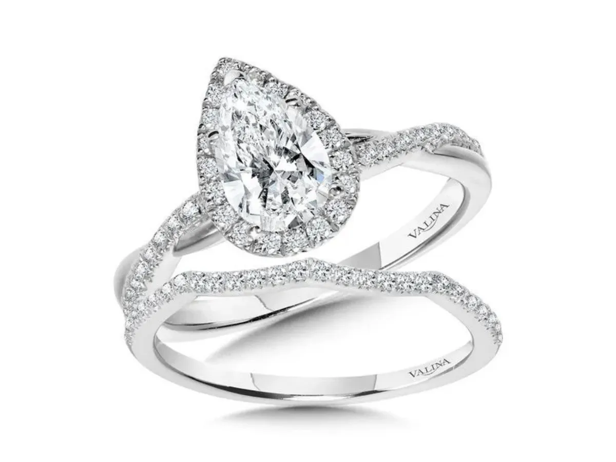 Pear halo diamond bridal set in white gold