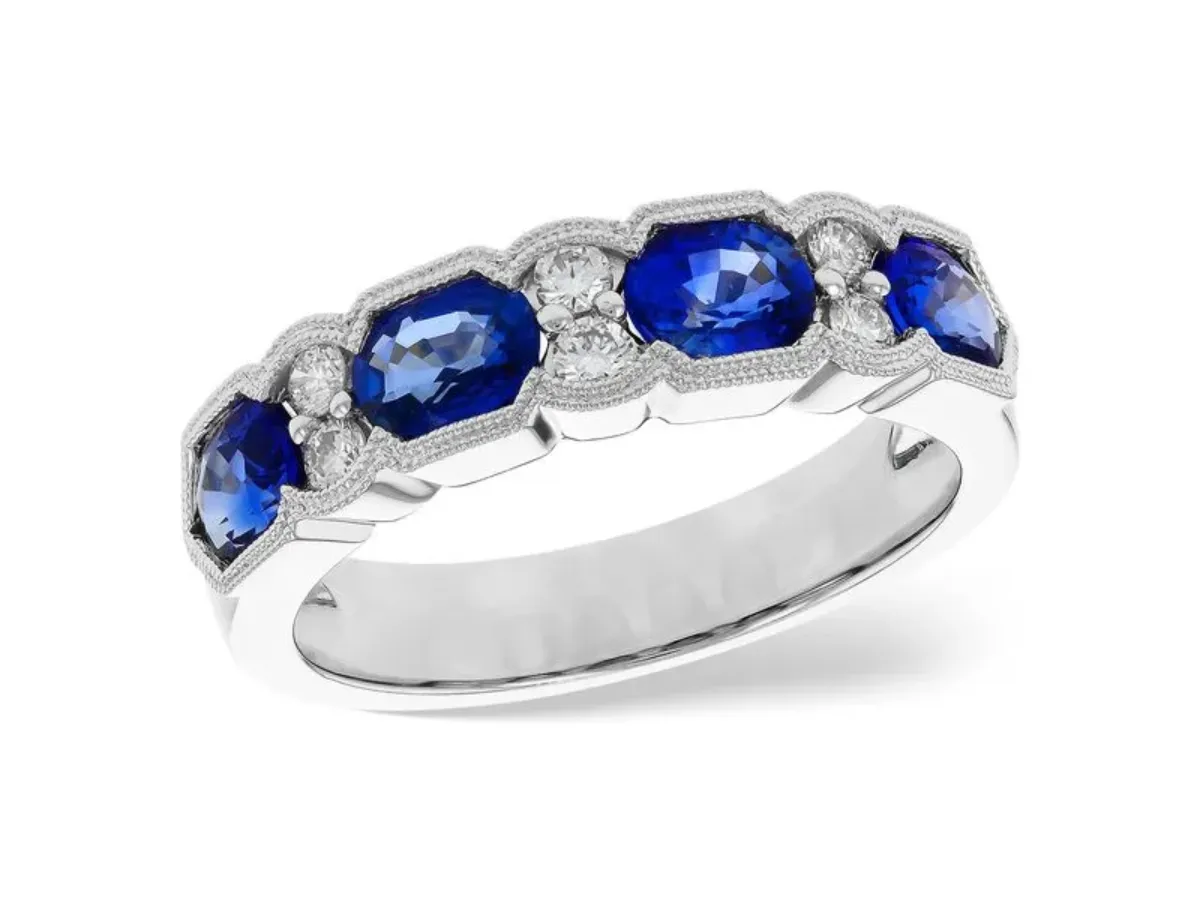Blue sapphire and diamond anniversary band in white gold