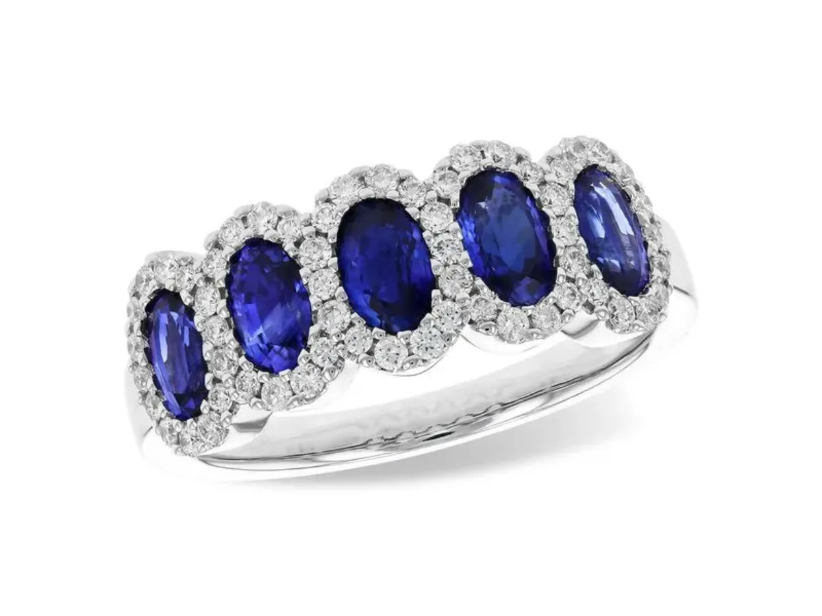 Five-stone blue sapphire halo ring with diamonds