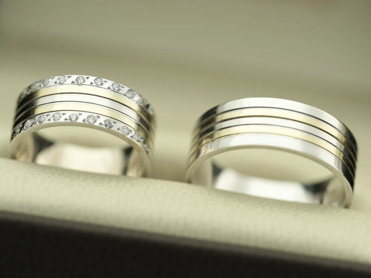 Close-up of diamond wedding bands on display