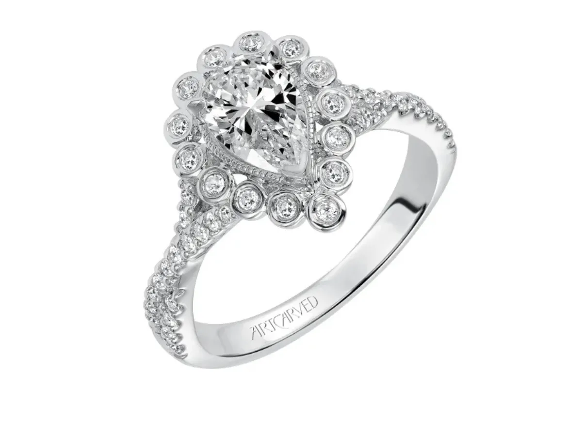 Pear-shaped halo diamond engagement ring in white gold