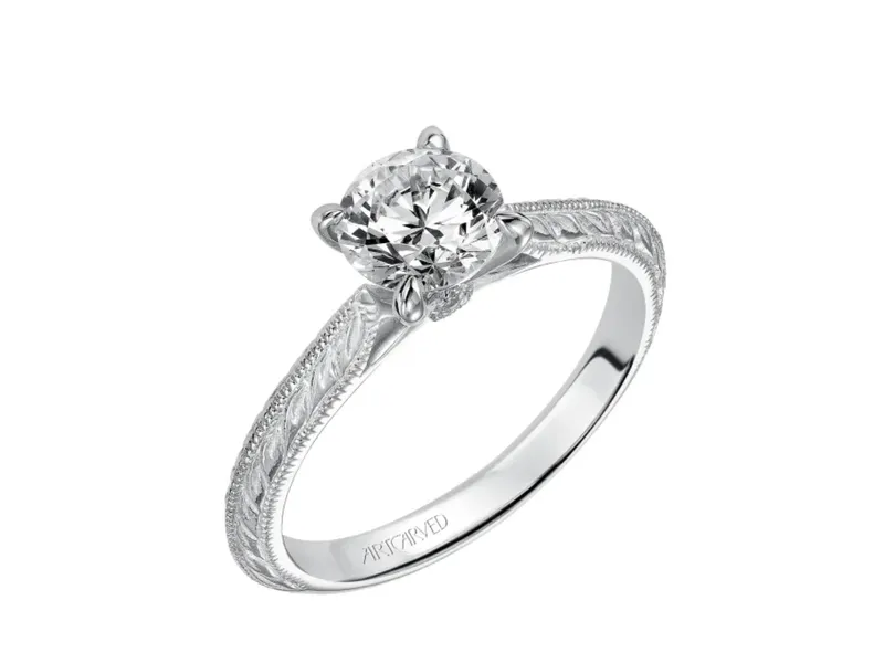Read article: Tension Set Stones in Modern Wedding Bands 