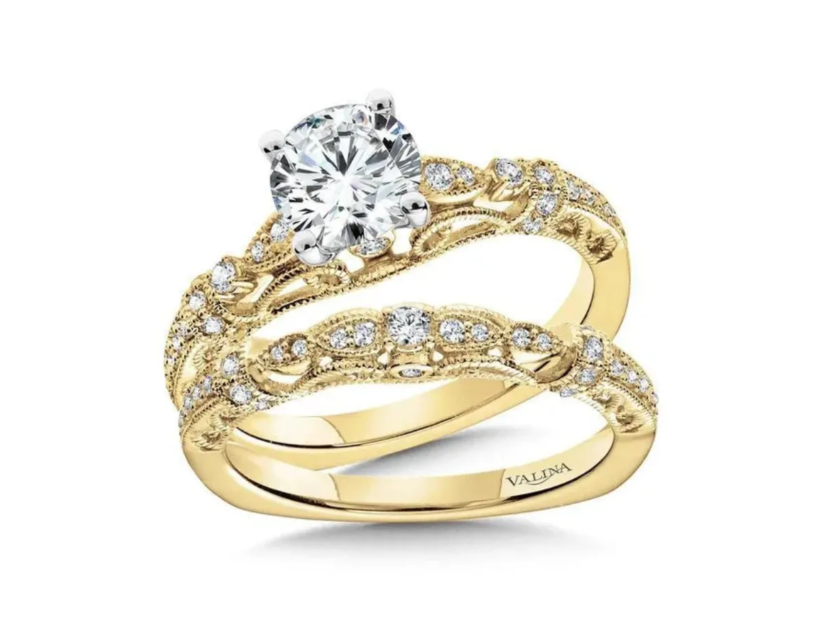 Yellow gold diamond ring with matching wedding band