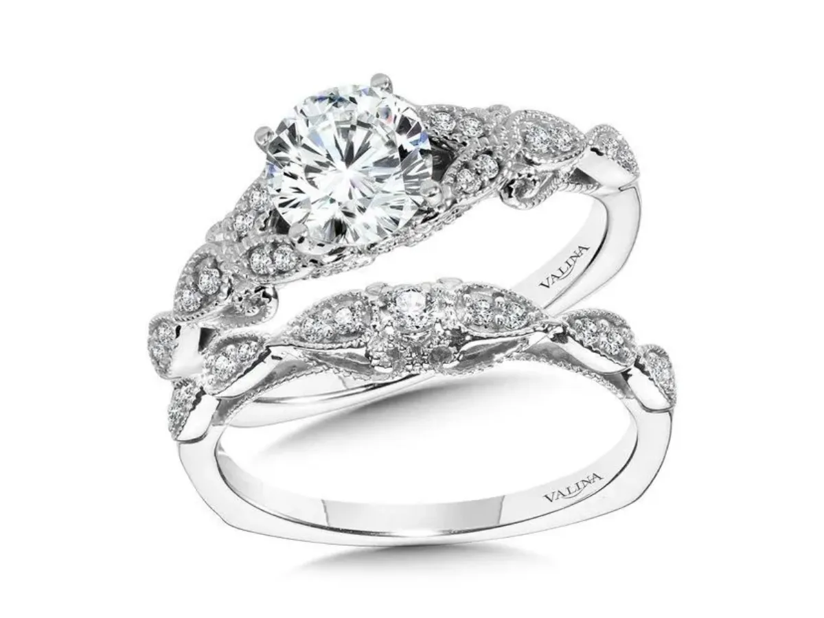 White gold vintage diamond ring with matching band