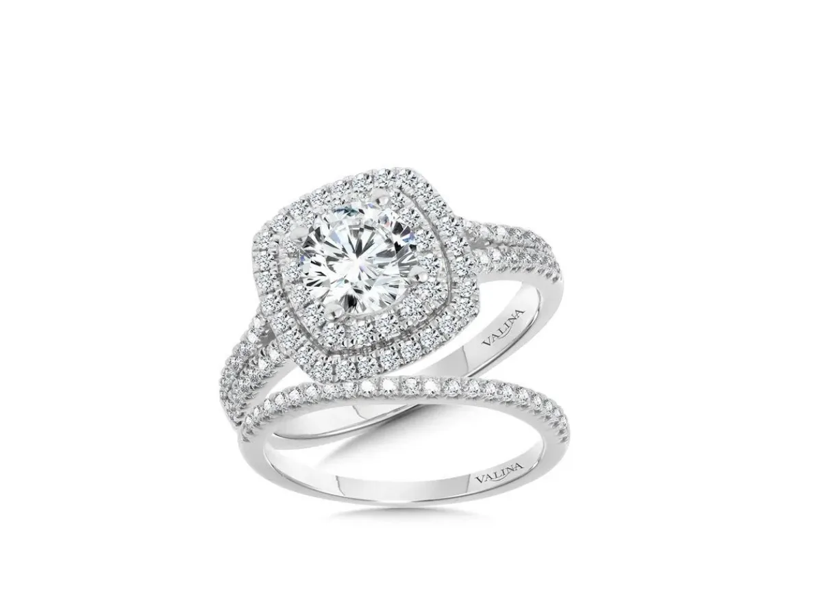 White gold halo diamond ring with matching band set