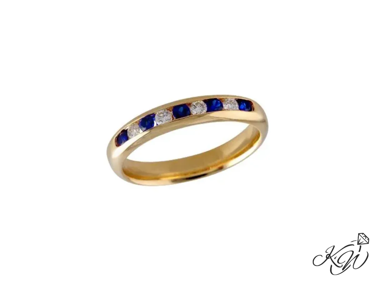 Gold wedding band with blue sapphires and diamonds