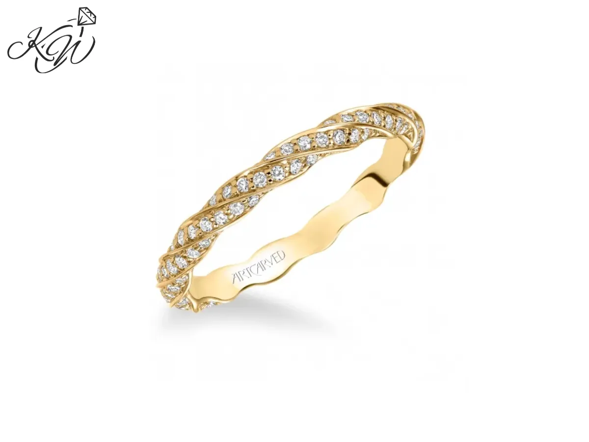 White gold twisted diamond wedding band with pavé stones