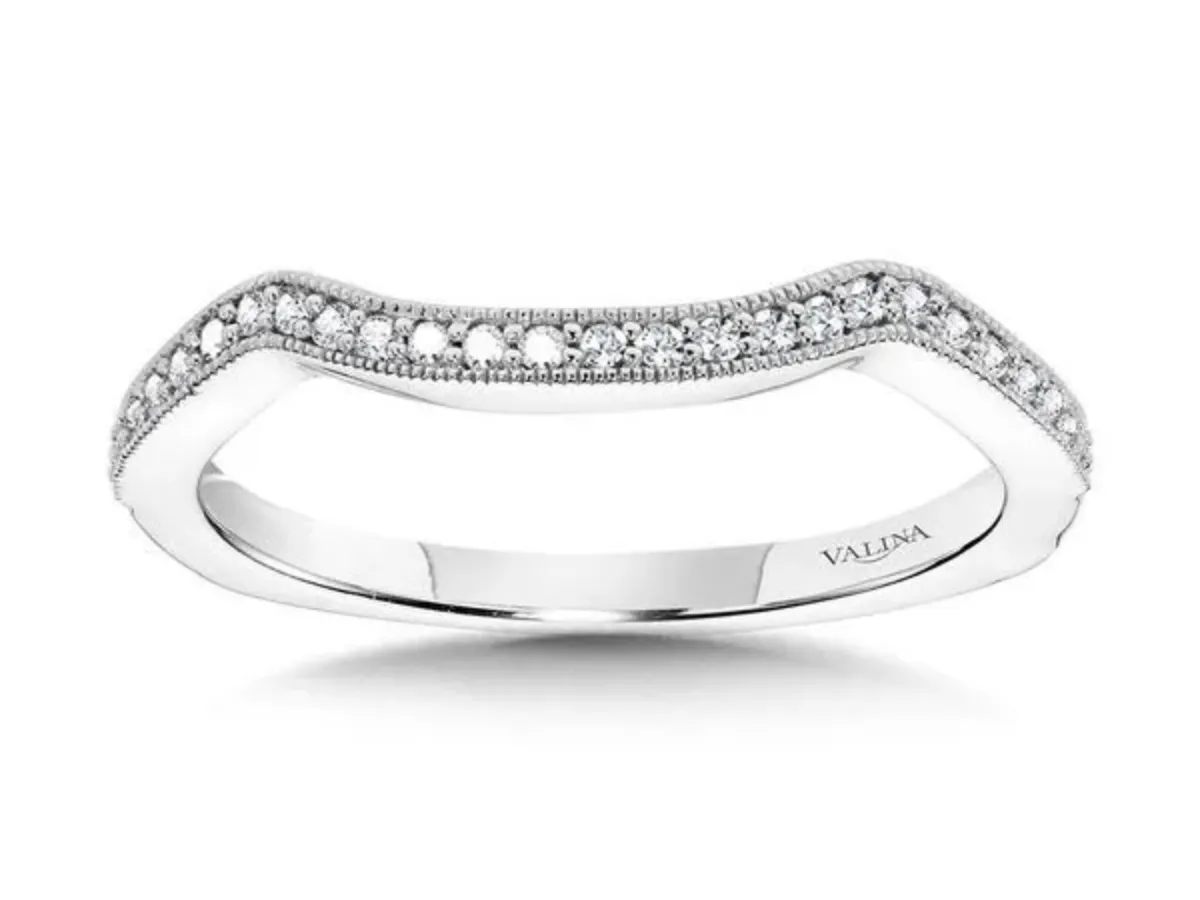 Curved diamond pav&eacute; wedding band.
