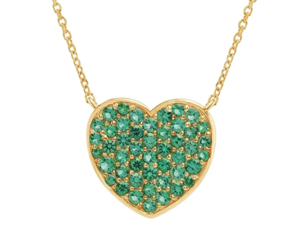 Green gemstone heart pendant in yellow gold chain