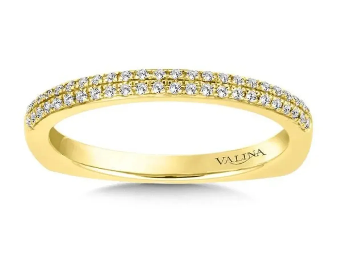 Yellow gold diamond wedding band with pav&eacute; stones