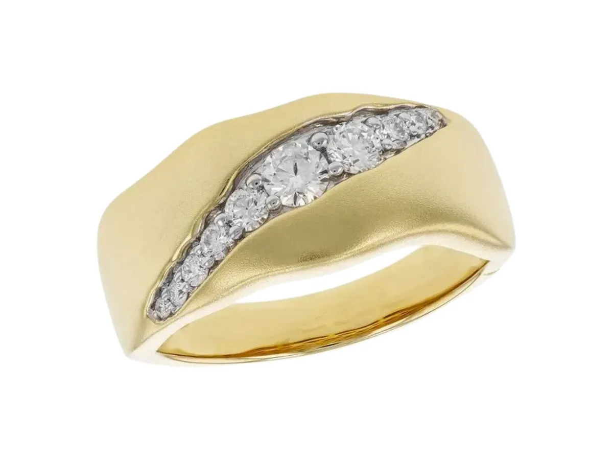 Matte yellow gold ring with channel set diamonds