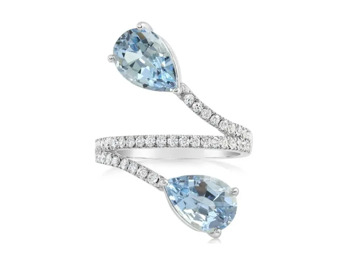 Aquamarine bypass ring with diamond pavé band