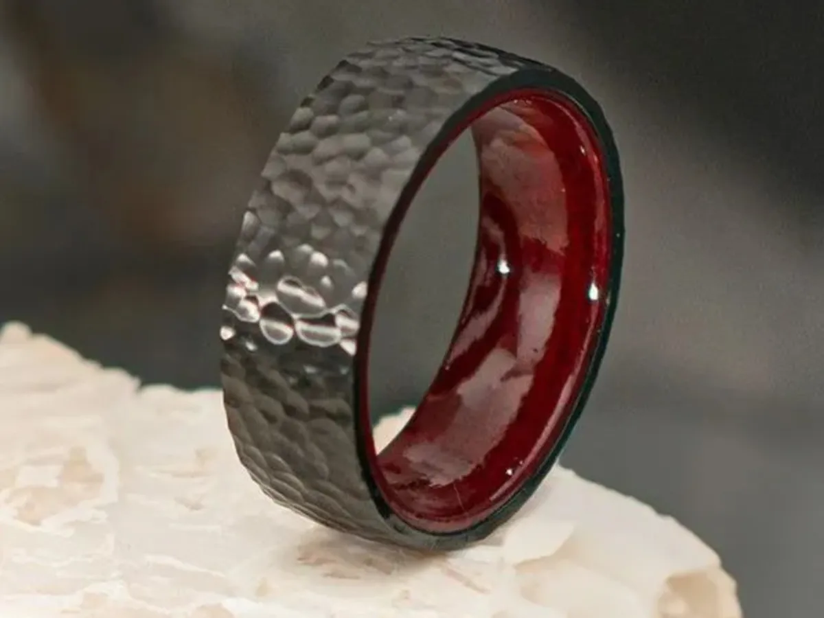 Diamond eternity ring with bezel set round stones