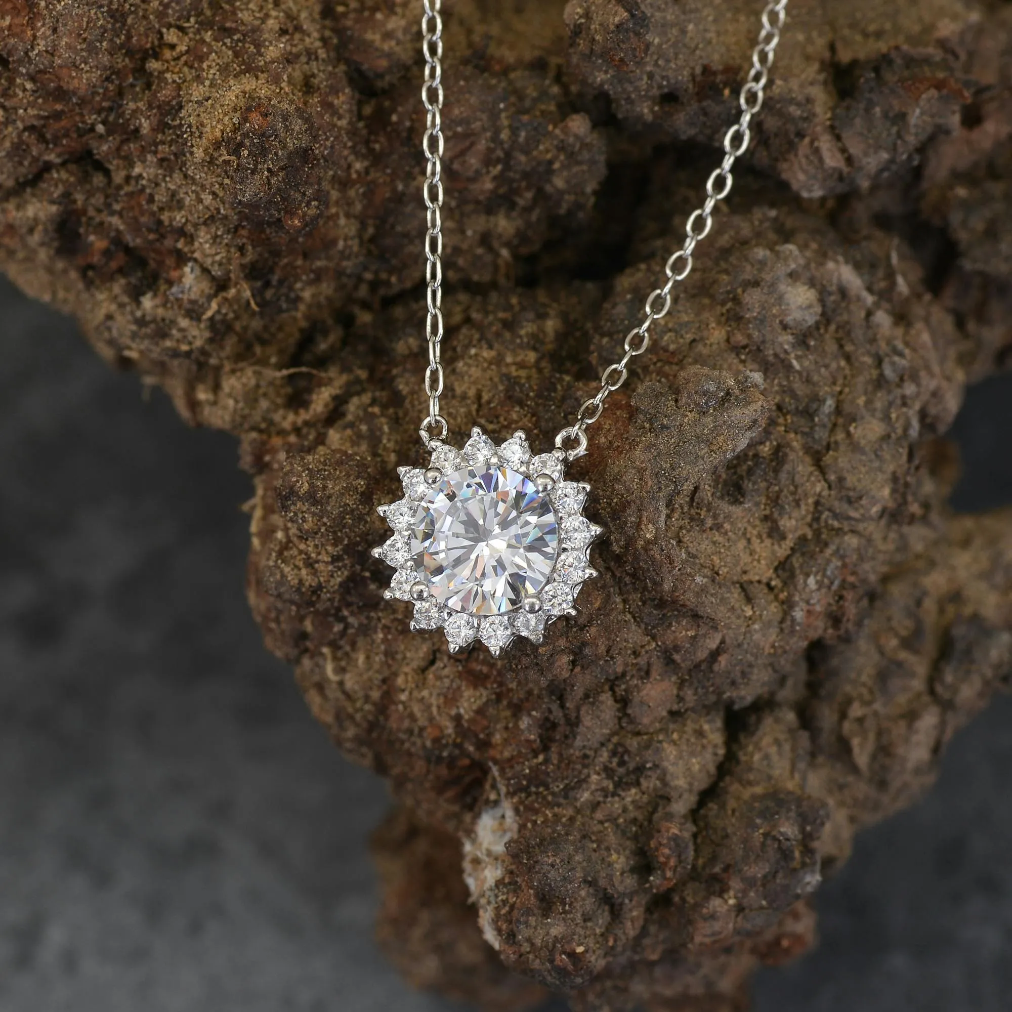 Close view of diamond pendant on wood background
