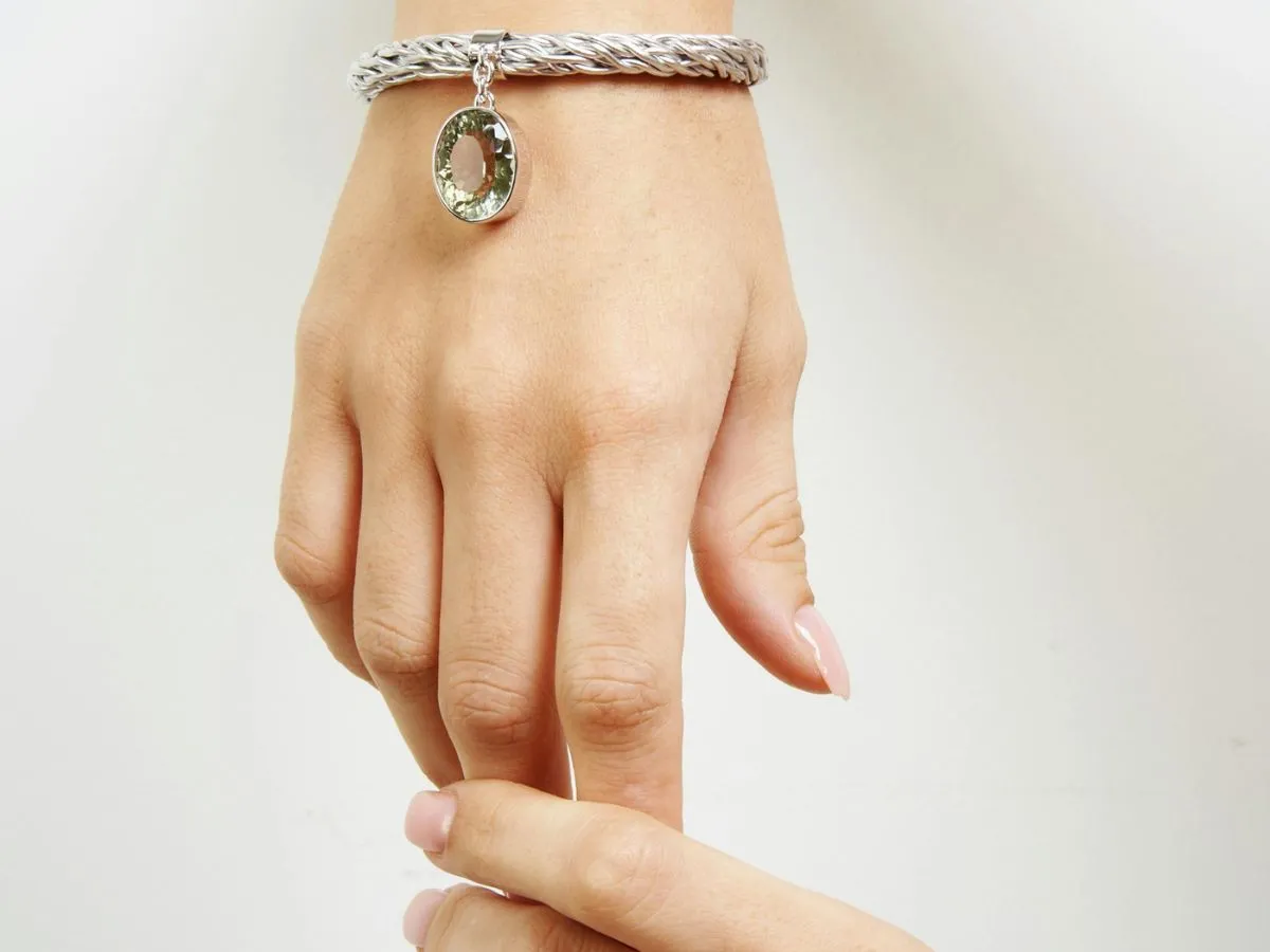 Silver bracelet with oval pendant
