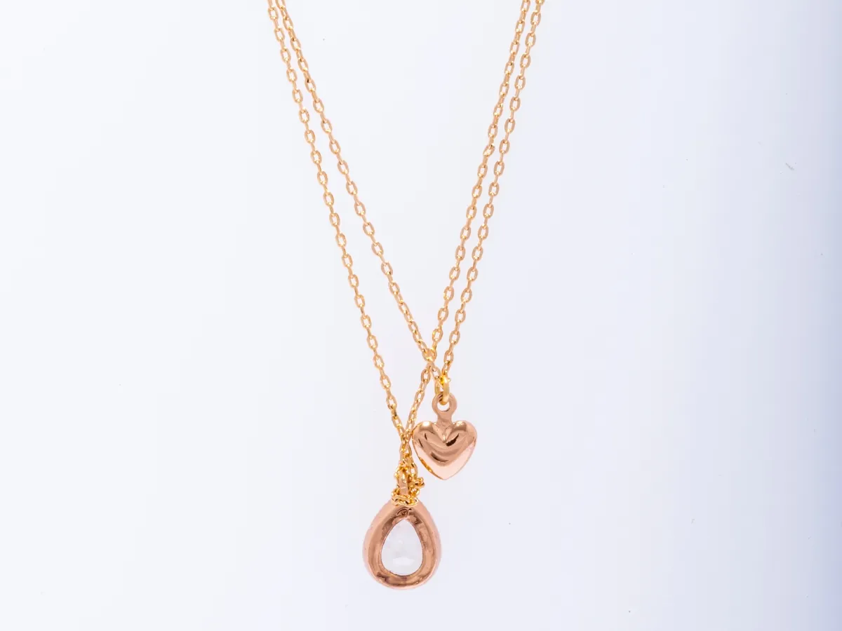 Gold layered necklace with teardrop charm