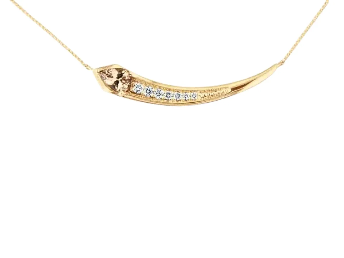 Curved gold necklace with diamonds
