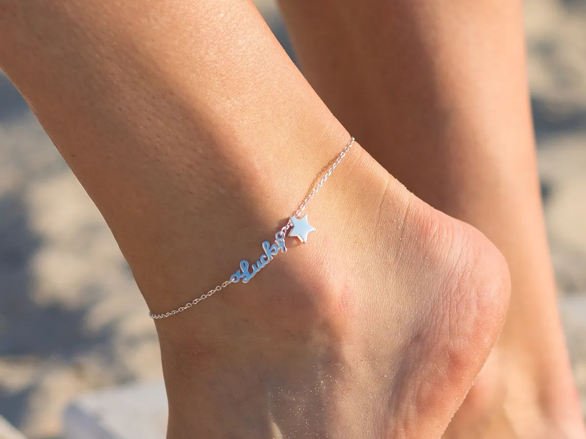 Silver anklet with lucky charm