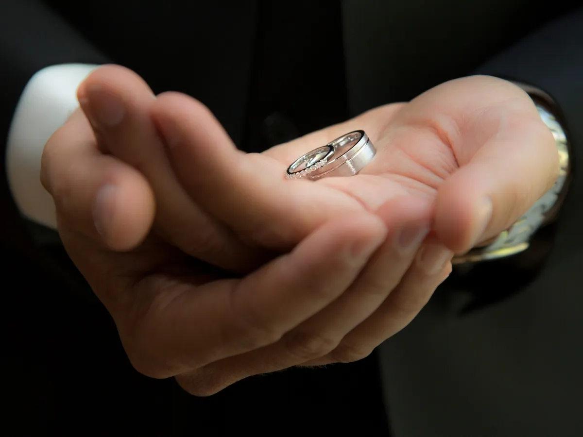 Wedding rings held in hand