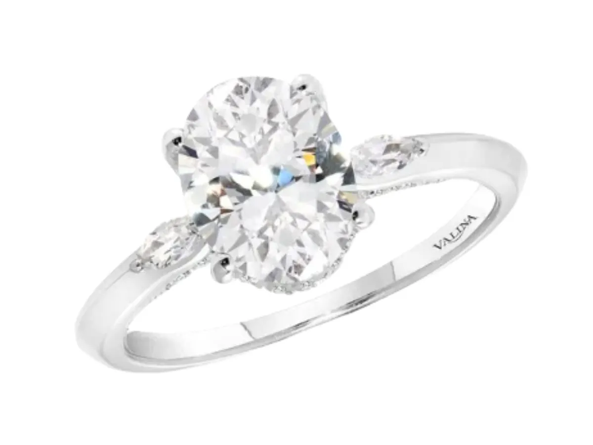 Oval diamond ring with side stones