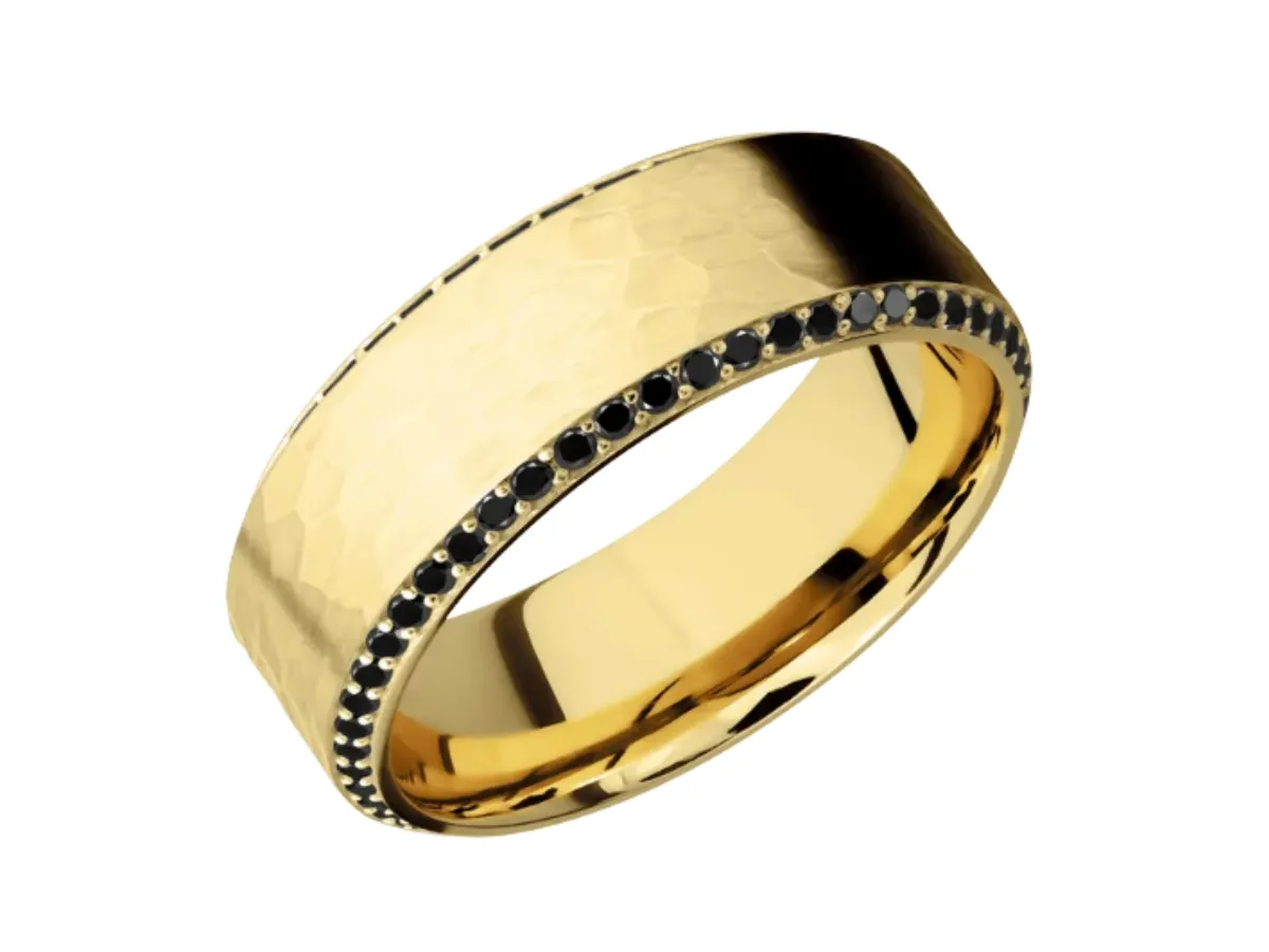 Hammered yellow gold ring with black diamonds
