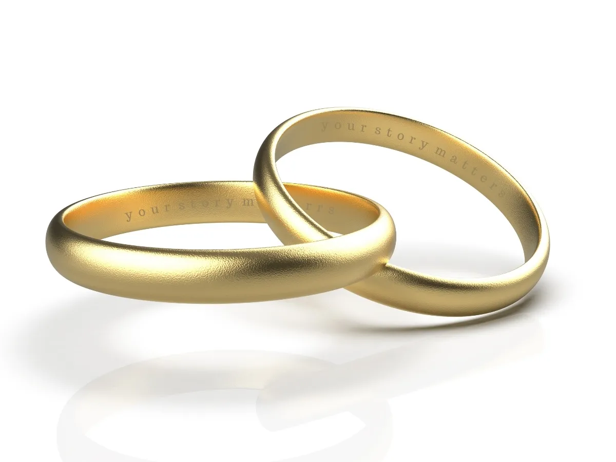 Gold wedding rings engraved-your story matters
