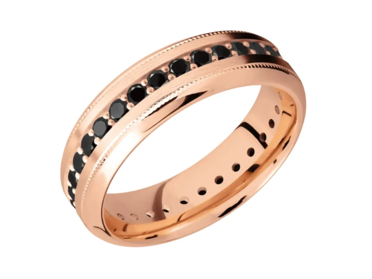 Rose gold ring with black diamonds.