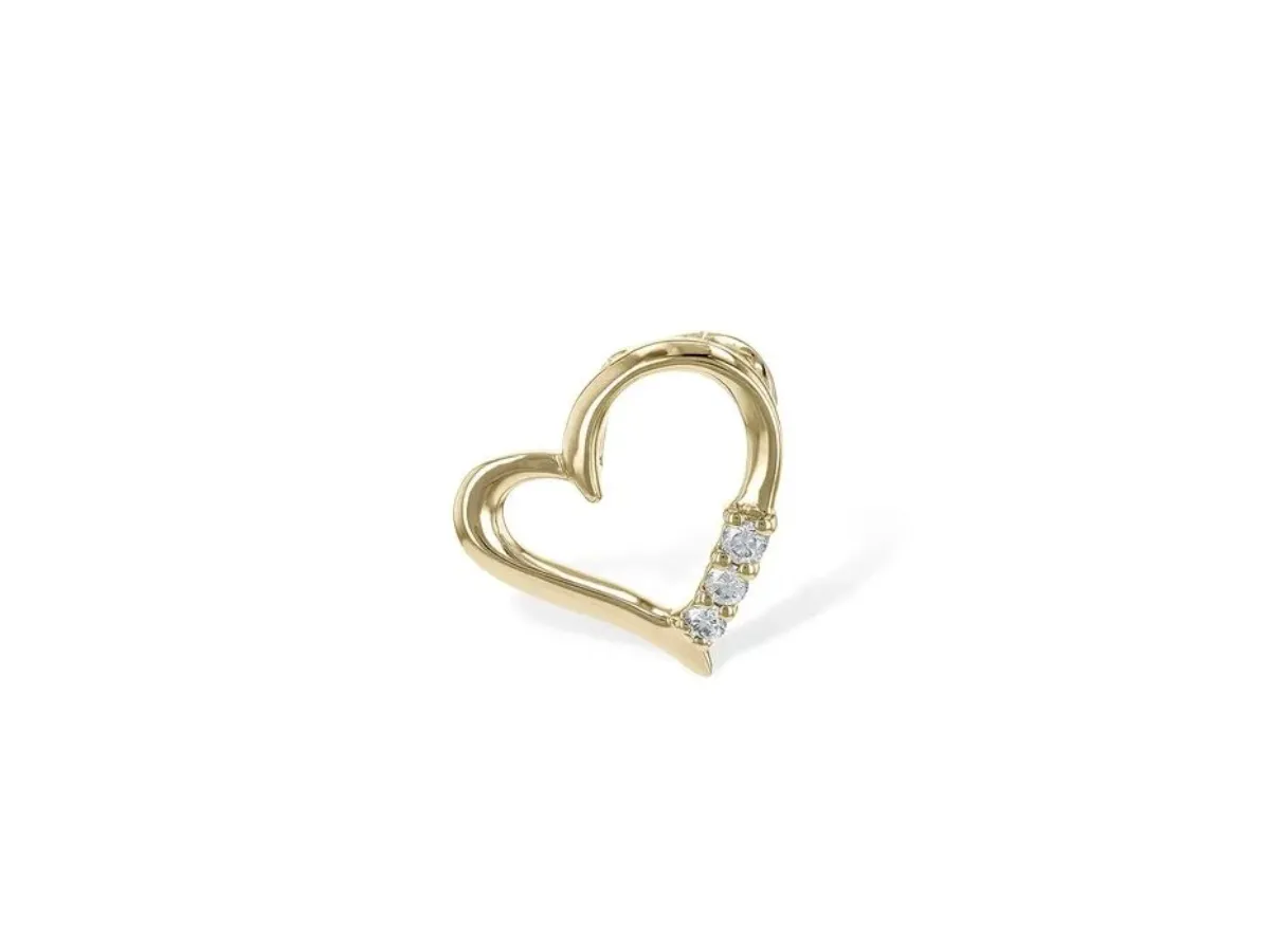 Gold heart-shaped earring with diamonds