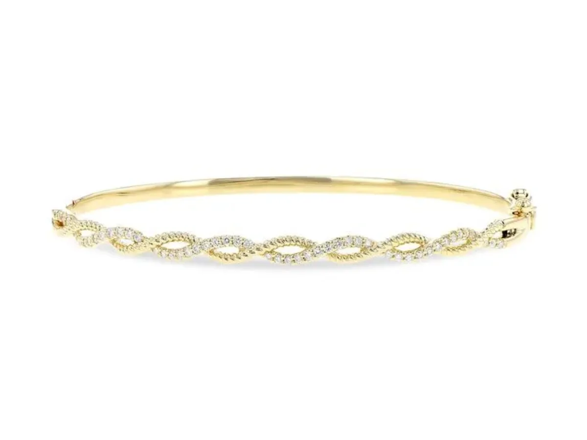 Diamond-studded gold bangle bracelet
