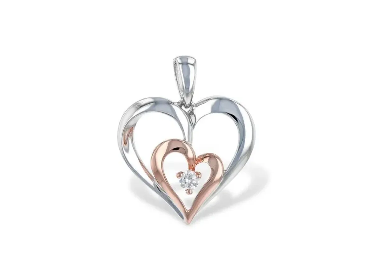 Two-tone heart pendant with diamond
