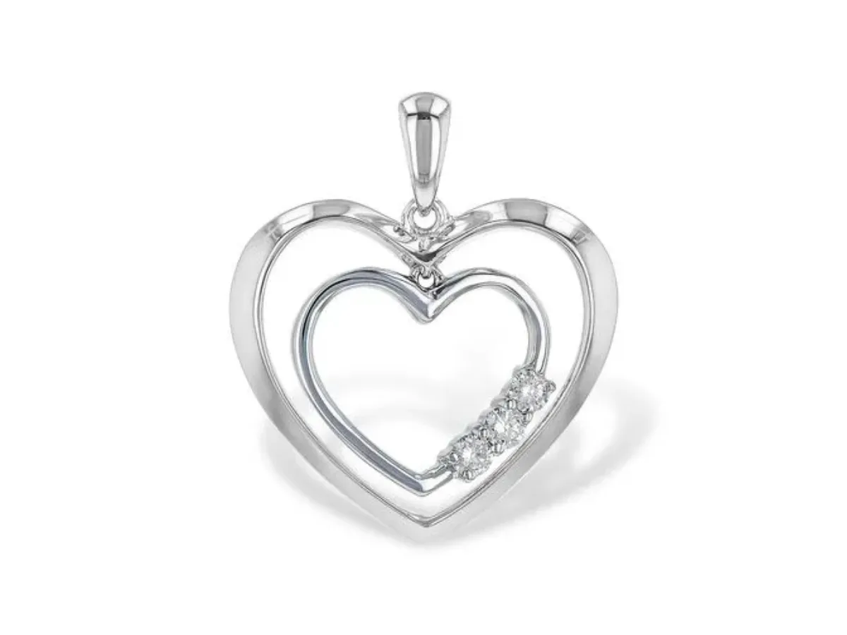 Silver heart pendant with diamond accents