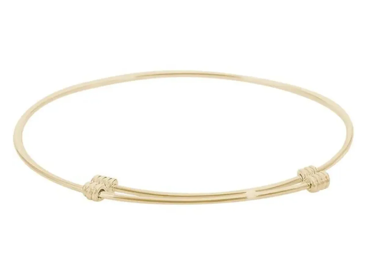 Minimalist yellow gold wire bangle