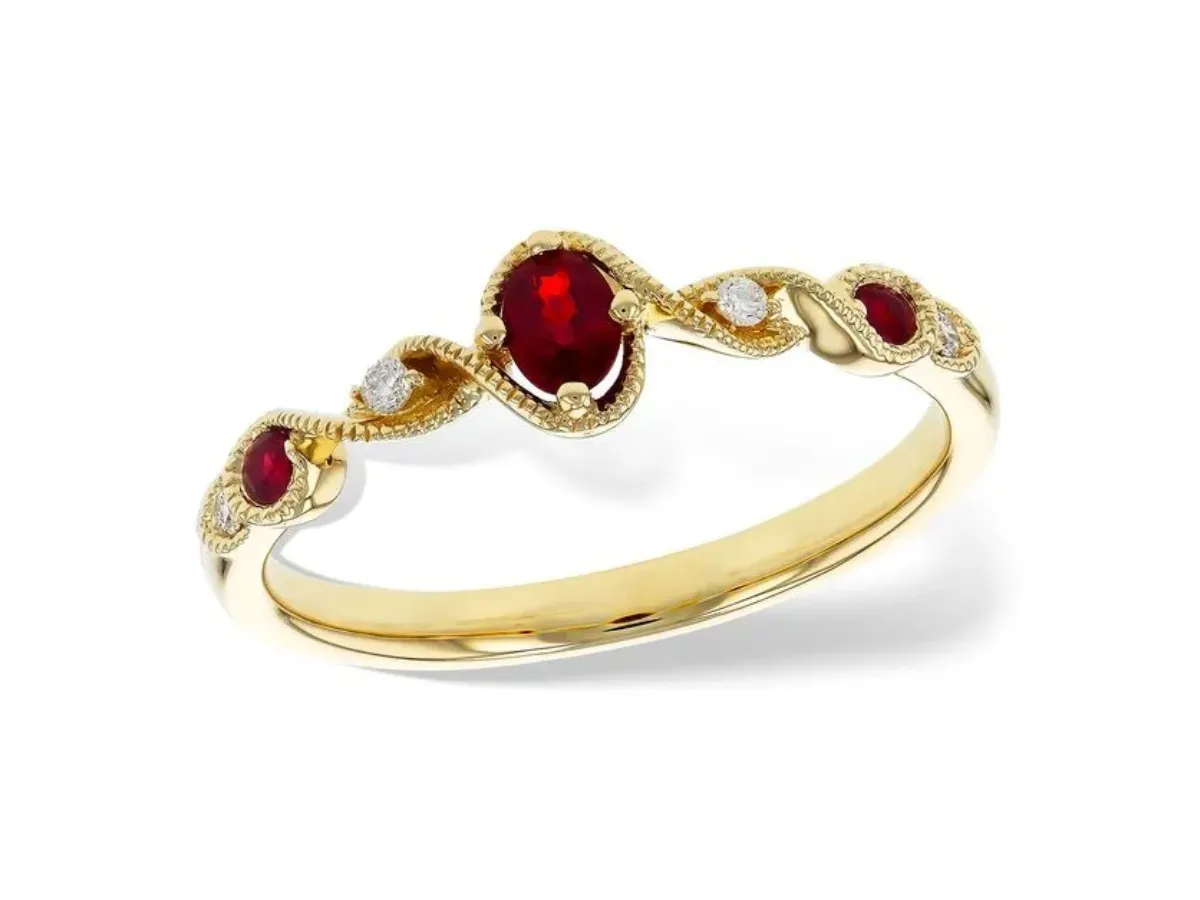 Gold ruby and diamond accent ring