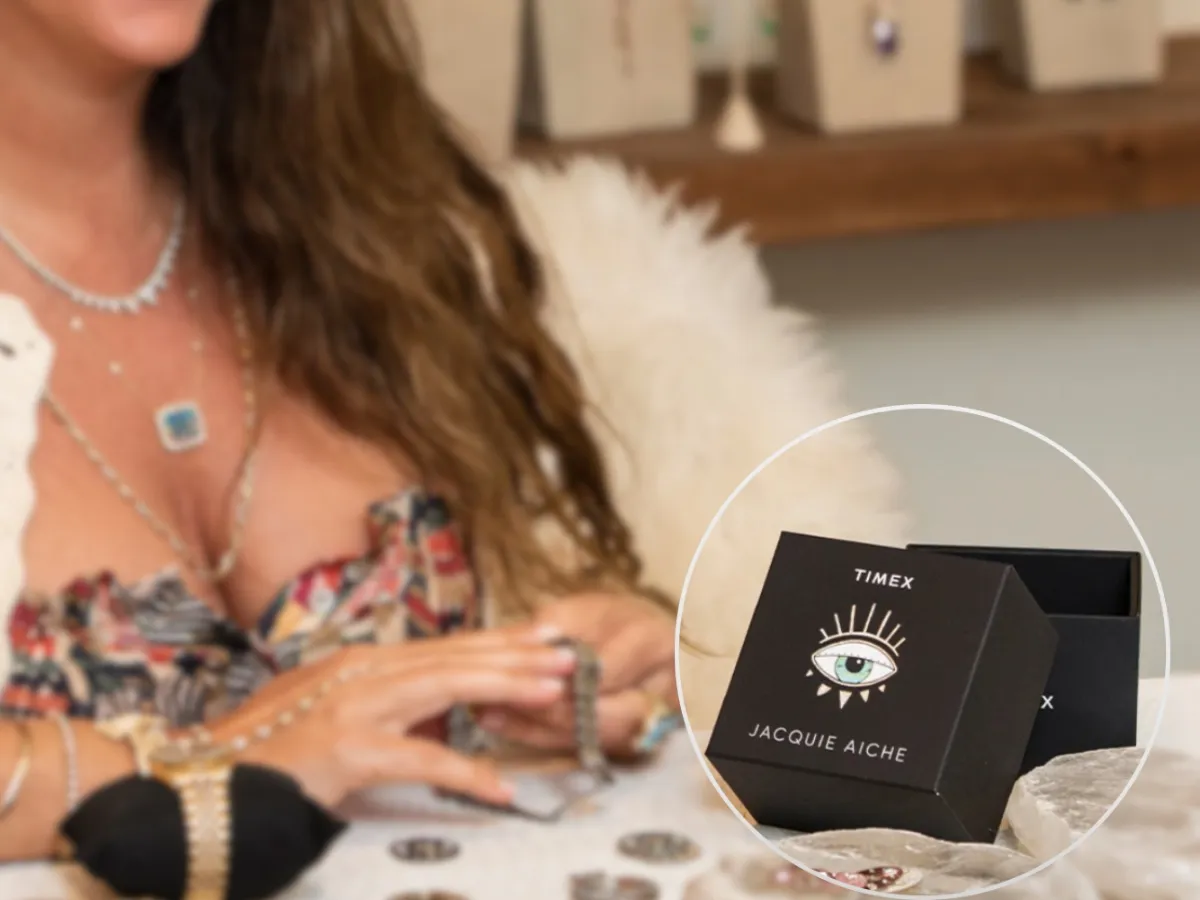 Jewelry designer beside branded box