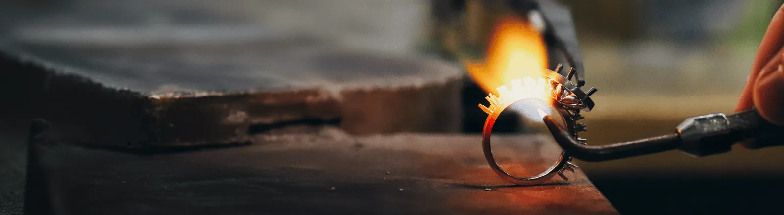 Woman displaying one-of-a-kind engagement rings