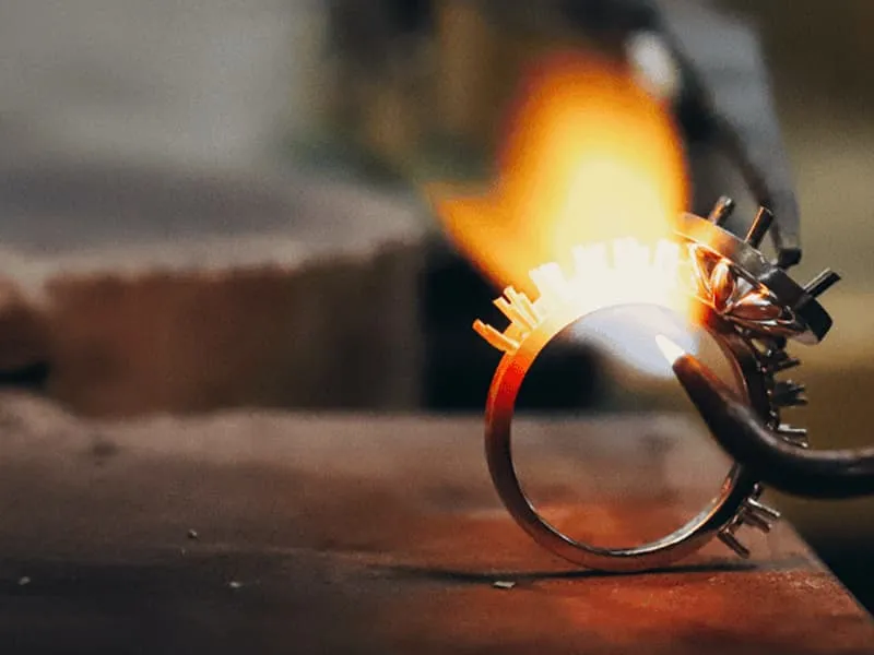 Woman displaying one-of-a-kind engagement rings