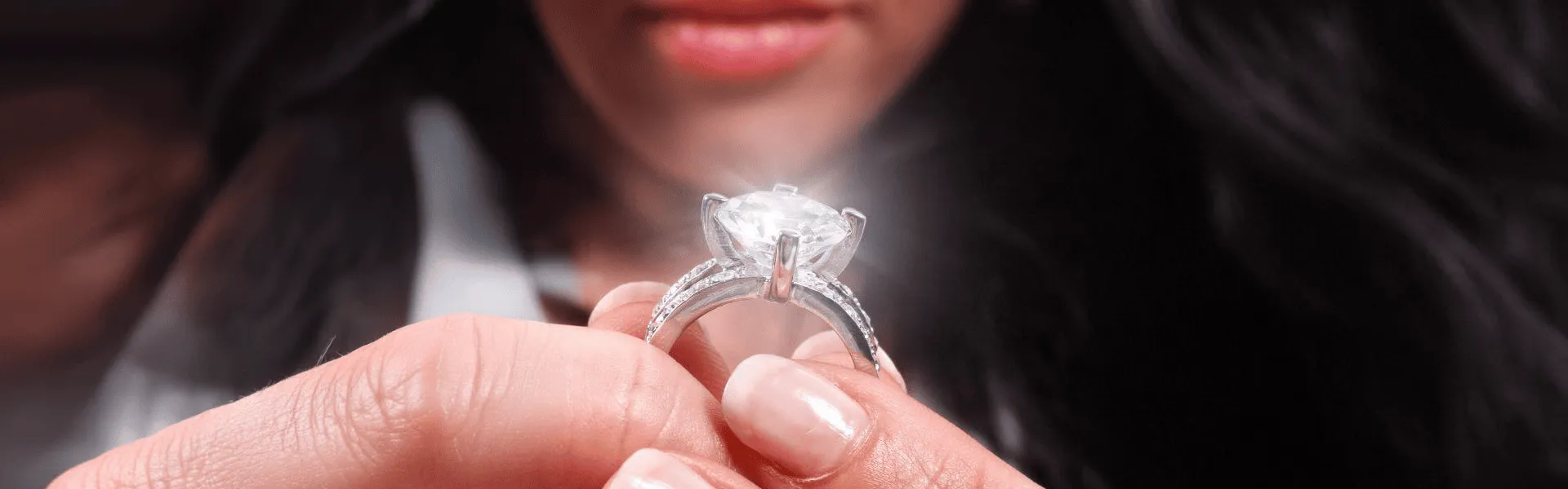 Woman displaying one-of-a-kind engagement rings