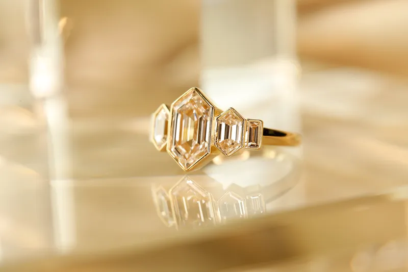 A three stone diamond engagement ring at Kirk & Company Jewelers