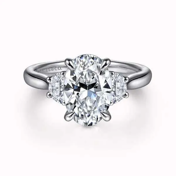 Oval diamond engagement ring with side stones. Click to explore more engagement rings at Koerbers Fine Jewelry.