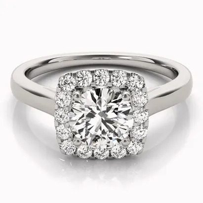 Elegant halo engagement ring featuring a round center diamond surrounded by smaller diamonds on a white gold band.