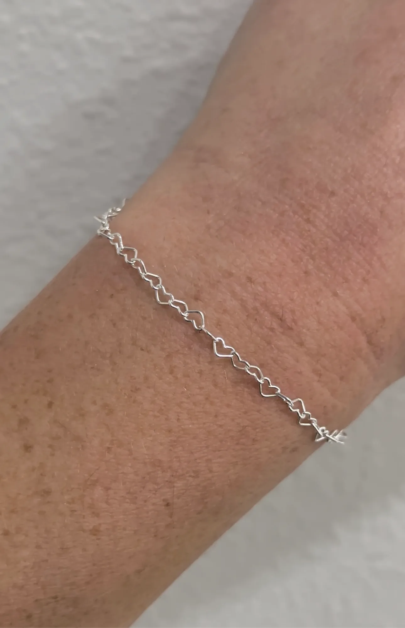 sterling silver heart link permanent jewelry at Kiefer Jewelers