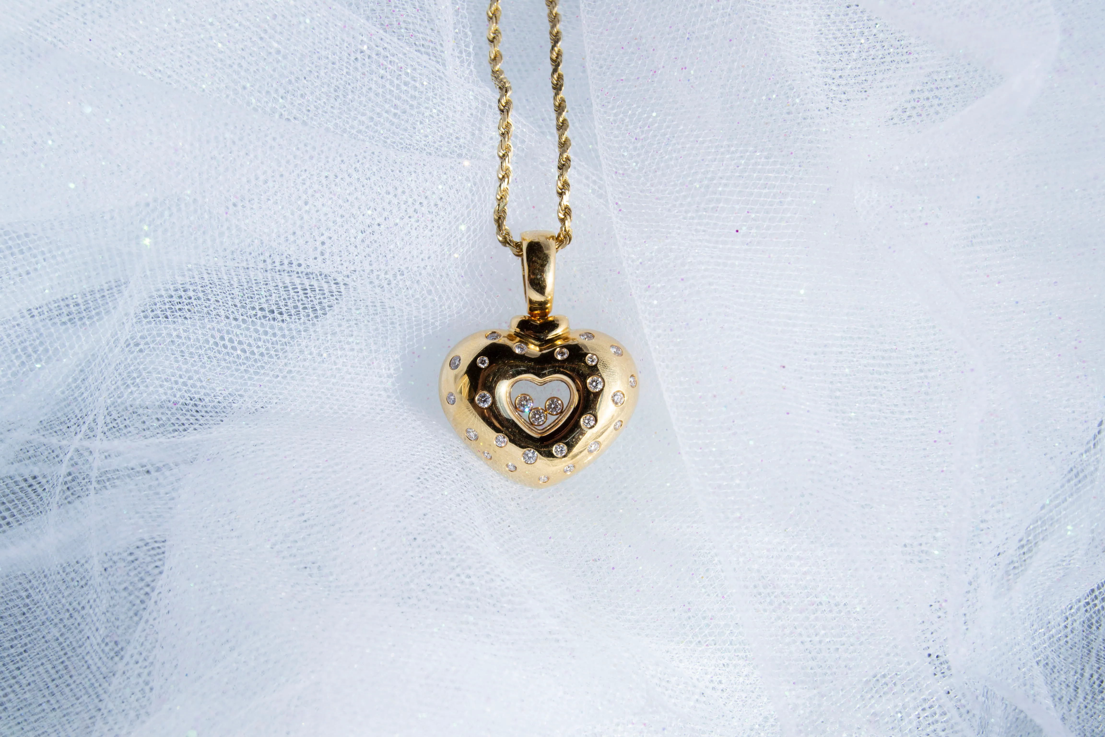 yellow gold chopard heart diamond pendant