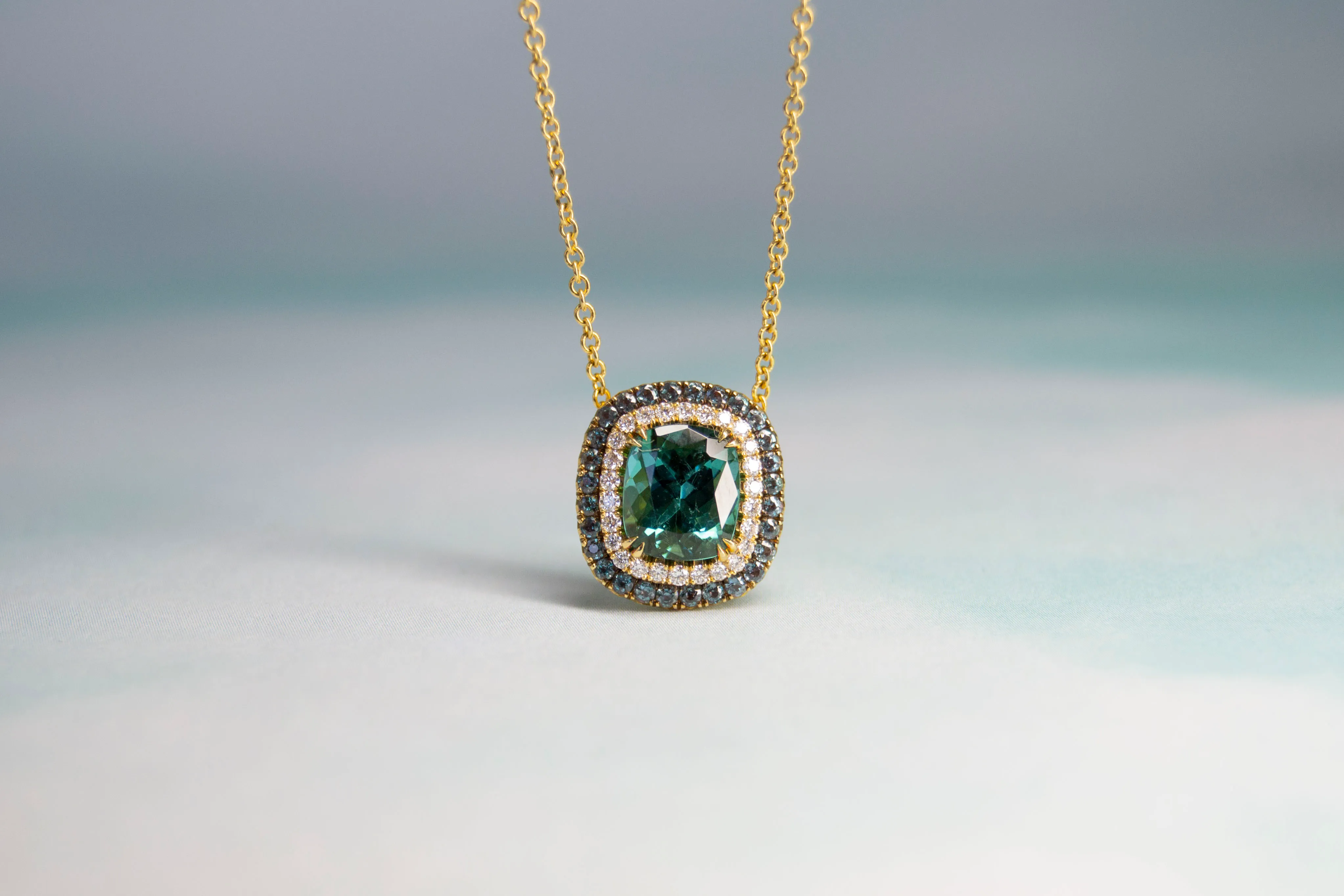 Omi Privé yellow gold tourmaline pendant with alexandrite and diamond halos