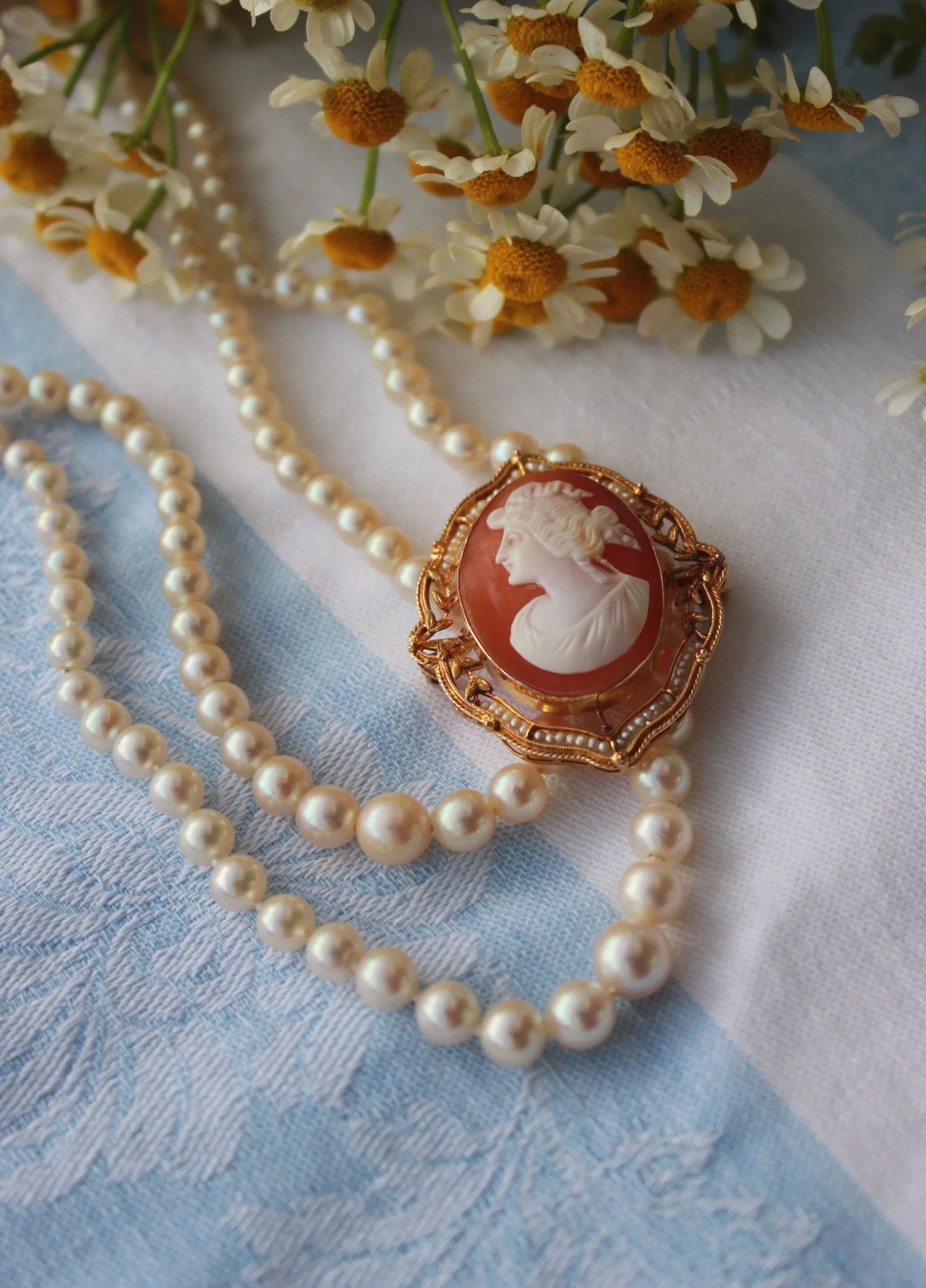 Akoya Pearl Strands and Vintage Pearl Cameo styling pearl strand itricate vintage design The Diamond Center Claremont, CA